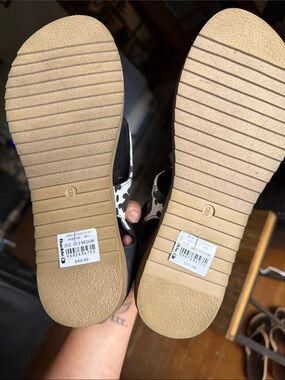 Very G Cow-Print Platform Sandals in Black and White